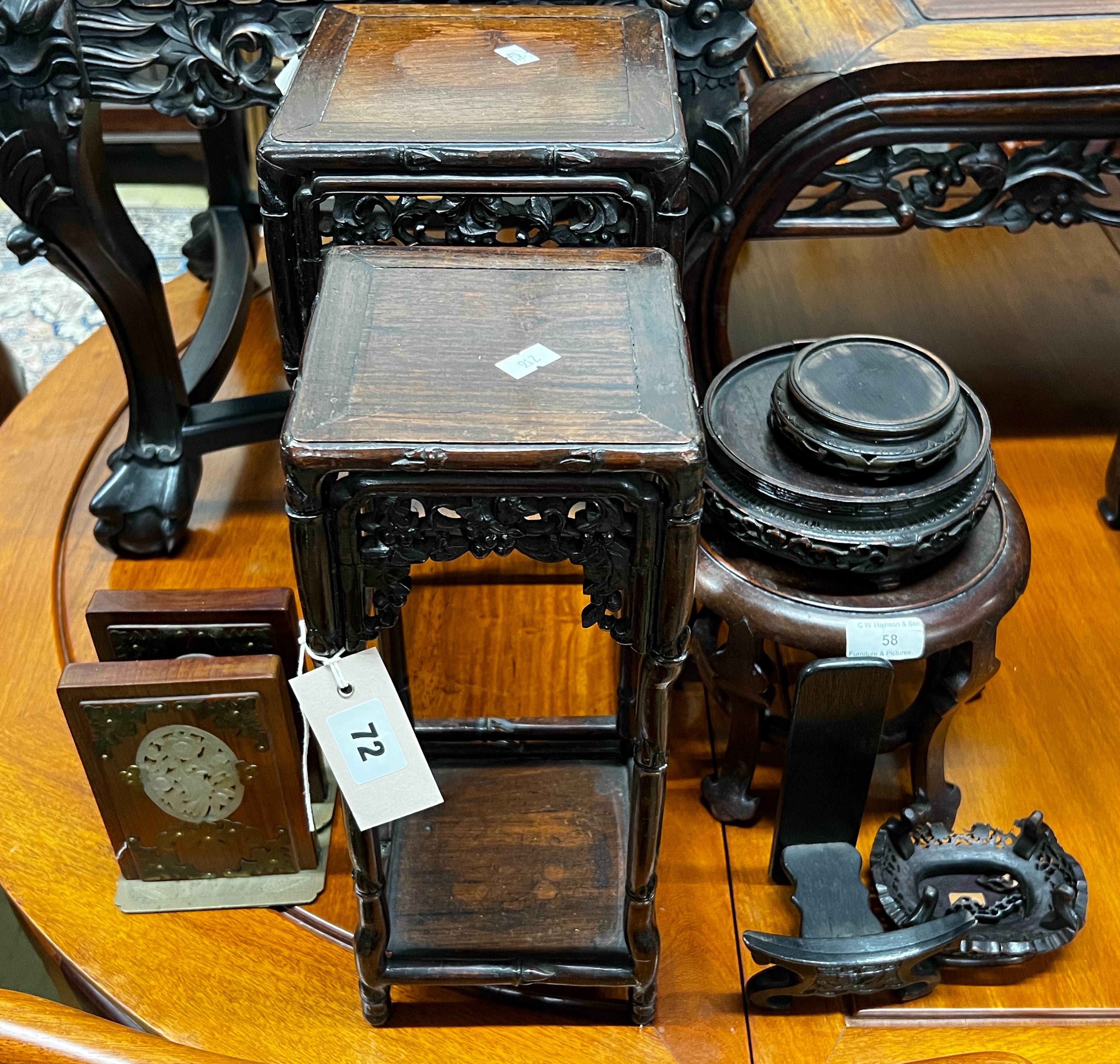 Seven assorted Chinese vase / plate hardwood stands together with two jadeite mounted bookends, largest height 40cm